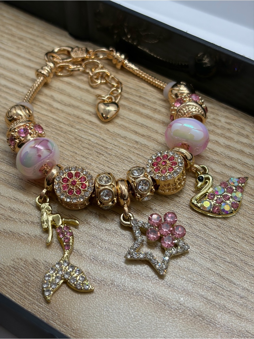 Gold-Tone Pink Charm Bracelet with Crystal Mermaid, Star & Swan Charms